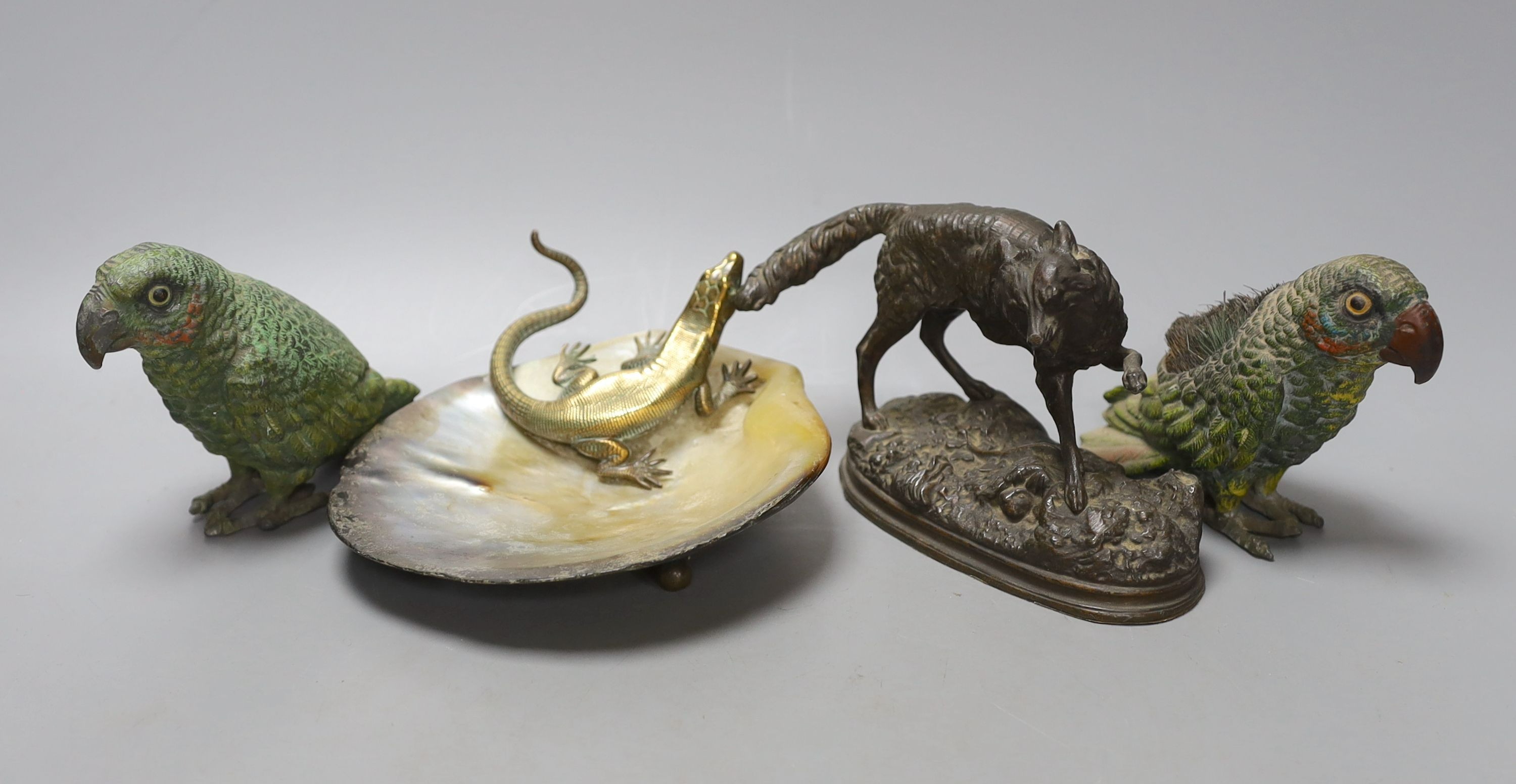 A bronze and mother-of-pearl 'lizard' dish, a bronzed spelter fox, 15cm long and two cold painted spelter parrots